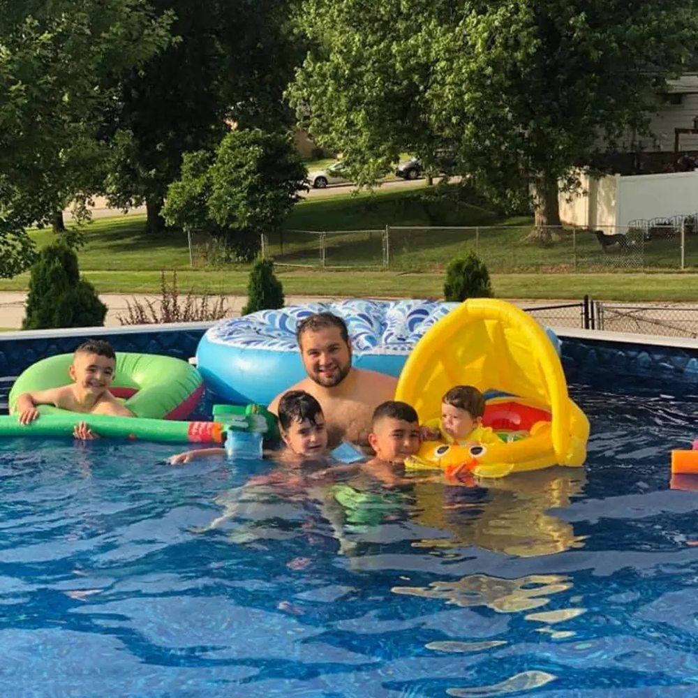 A skilled Mawby's Pools technician analyzing pool water quality in Cleveland South Euclid