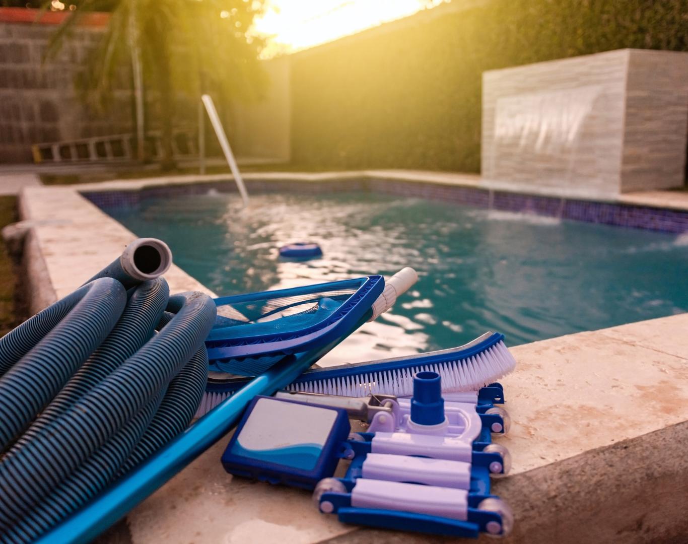 Routine maintenance performed during Pool Service in Lake County, OH for a residential backyard swimming pool